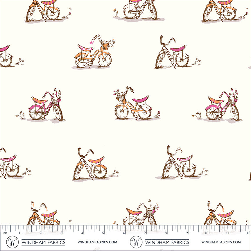 Pattern of small bicycles with pink seats on a white background, with a ruler at the bottom for scale.