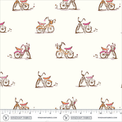 Pattern of small bicycles with pink seats on a white background, with a ruler at the bottom for scale.