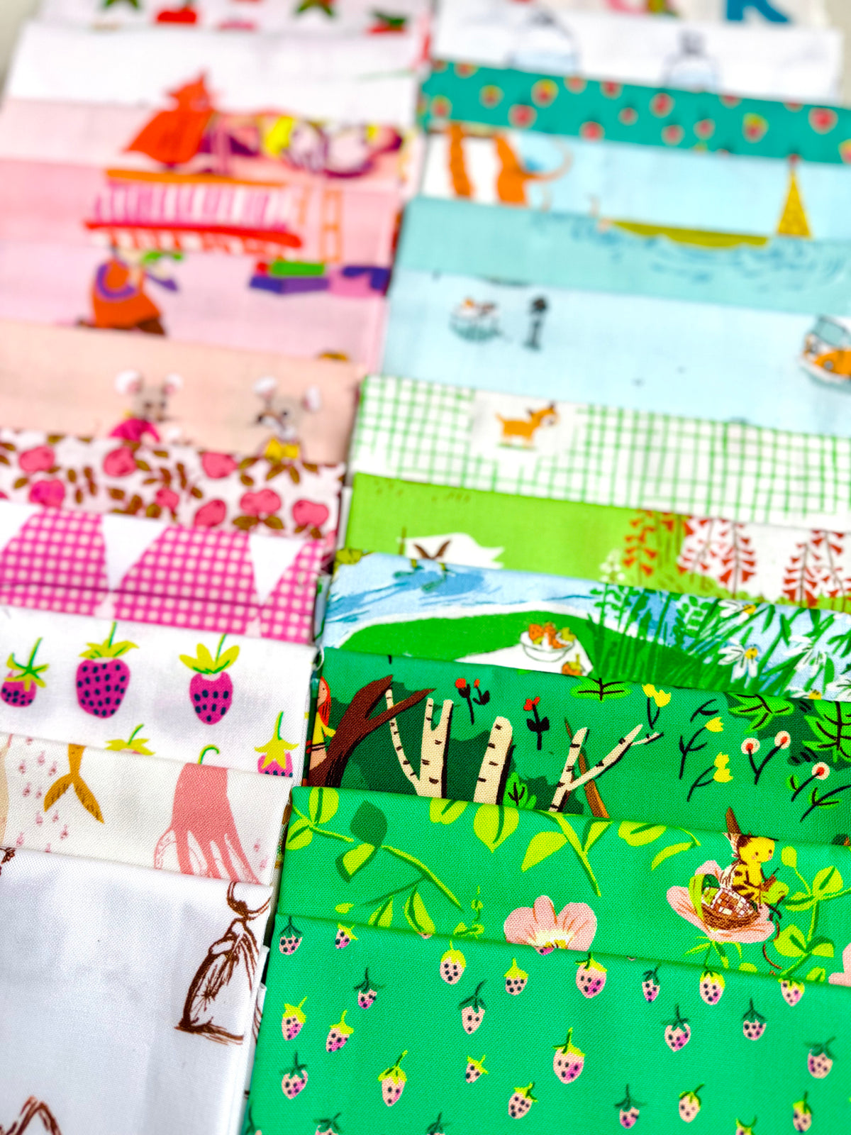 Collection of colorful fabric swatches with various patterns