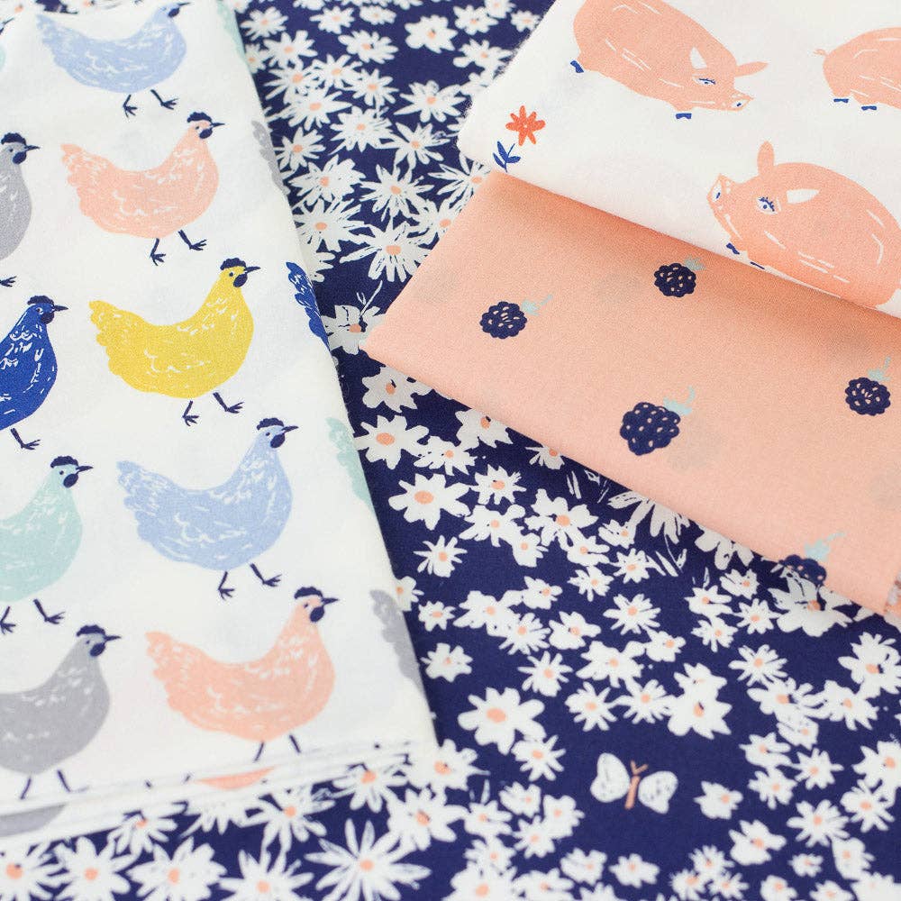 Collection of fabric swatches with chicken and floral patterns