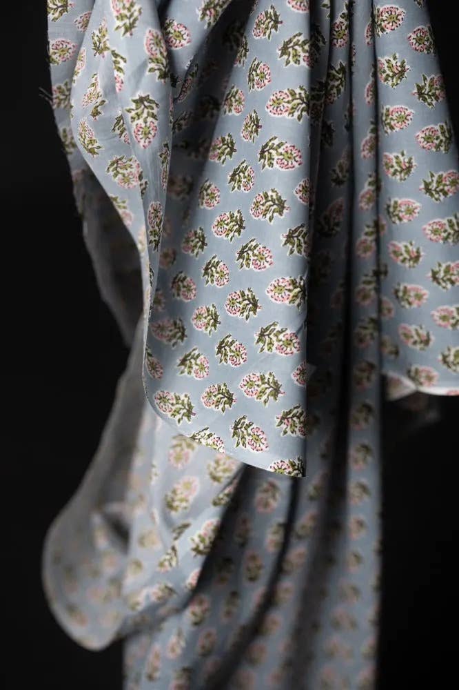 Floral patterned fabric with a dark background
