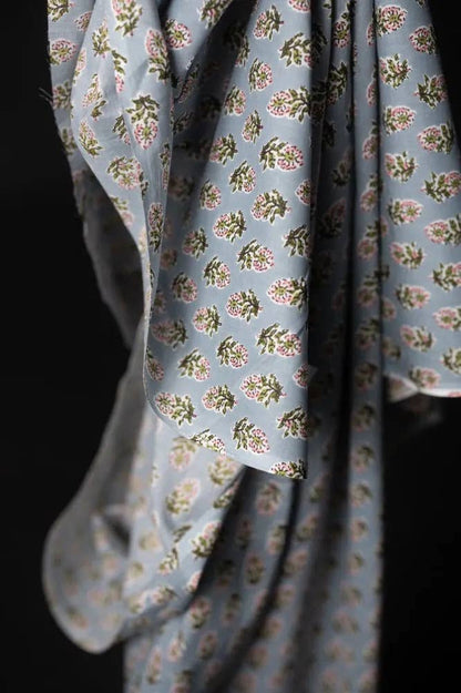 Floral patterned fabric with a dark background